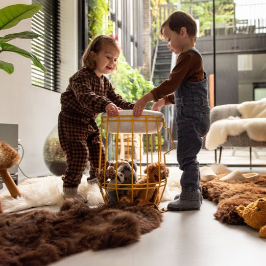 Kids using Weltevree carrier as toys storage